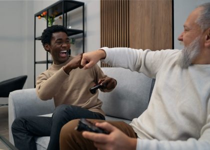 resized side view men playing videogame